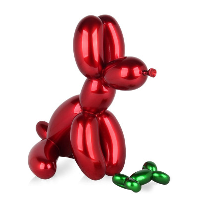 Scultura in resina raffigurante un palloncino rosso a forma di cane ed uno verde a forma di osso