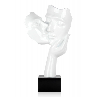 Statuetta in resina bianca laccata raffigurante il volto di due amanti intenti nello scambiarsi un bacio