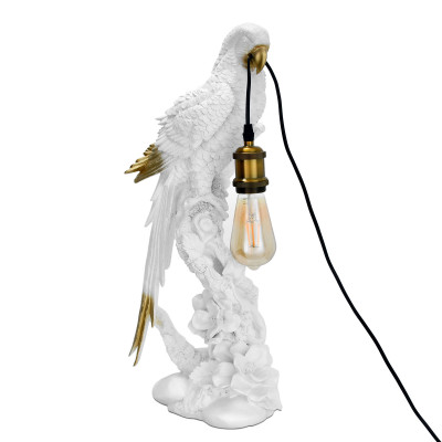 Lampada scultura in resina bianca e oro a forma di pappagallo posato su un ramo
