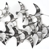 Scultura metallica a muro con ali di gabbiani tridimensionali