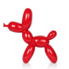 Profilo di una statuetta moderna in resina rossa a forma di cane palloncino