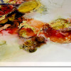 Pennellate oro, ocra e rosso su un quadro astratto