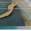 Scultura metallica da parete con soggetto gabbiani dorati in volo su sfondo in pittura