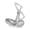 Scultura in resina argento effetto metallo rappresentante in modo stilizzato una donna seduta