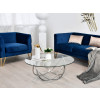 Consolle Star serie Luxury posizionata in un salotto con divani blu