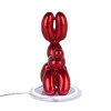 Retro di una lampada scultura a forma di cane palloncino in resina metallizzata color rosso