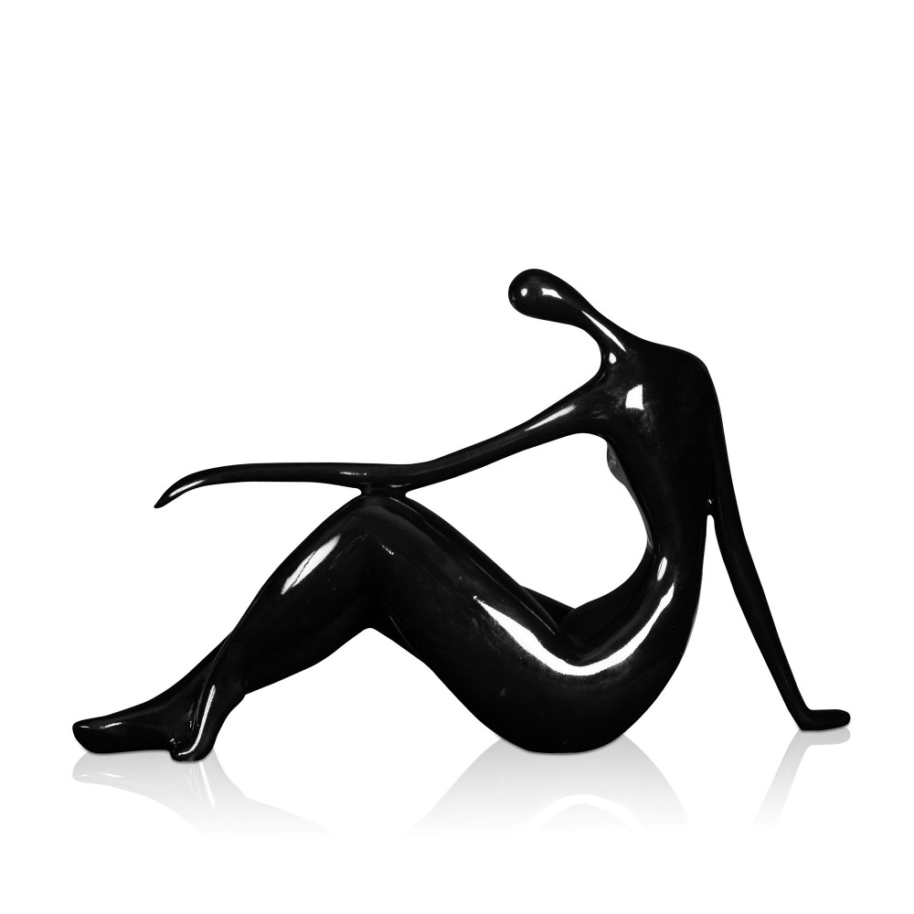 Statuetta moderna con tinta nera e laccatura raffigurante una donna seduta con gambe flesse e testa china di lato