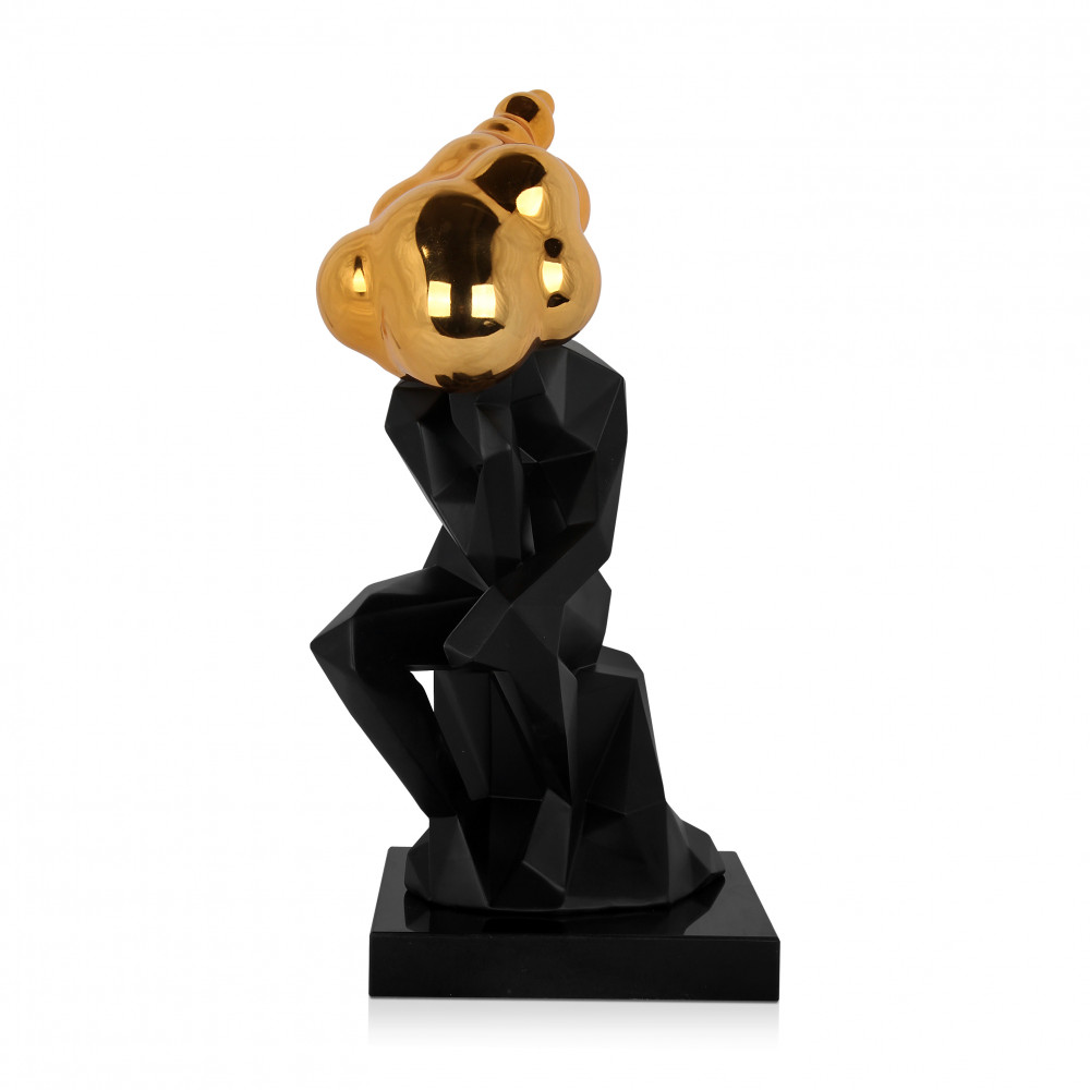 Statua in resina nera di un pensatore riprodotto con delle sfaccettature e con dettagli dorati