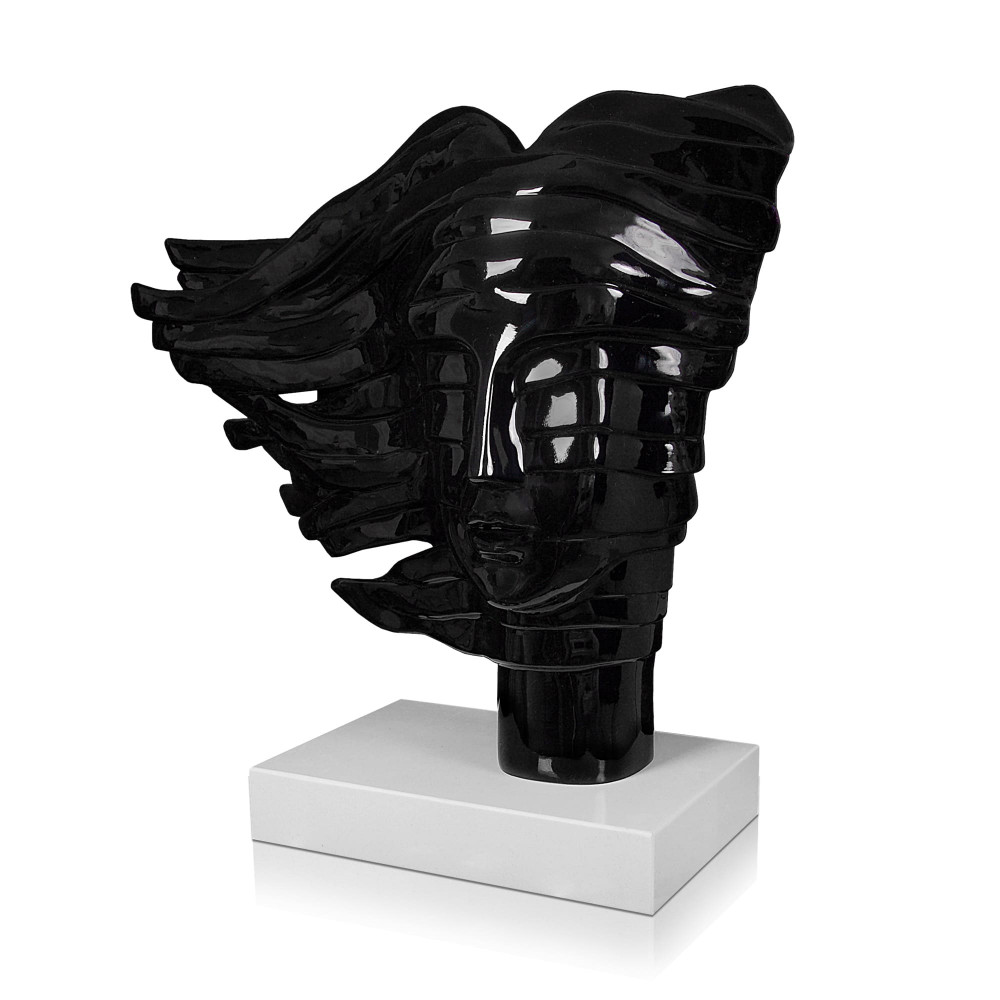 Statuetta moderna con chioma femminile agitata dal vento