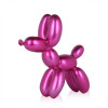 Scultura in resina rosa metallizzata di palloncino modellato a forma di cane