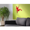 Ambiente living arredato in stile moderno con Scalatrice rossa laccata su parete verde