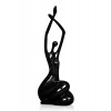 Statuetta figurativa in resina rappresentante un soggetto femminile con braccia sollevate in alto in colore nero