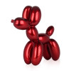 Realizzazione artigianale in resina rappresentante un cane creato con palloncini modellabili rosso metalizzato