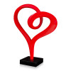 Statua in resina a forma di cuore e di colore rosso