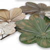 Dettaglio foglie stilizzate saldate su telaio in metallo mediante tecniche artigianali