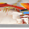 Dettaglio di quadro raffigurante soggetto astratto nei toni di rosso, arancione, bianco